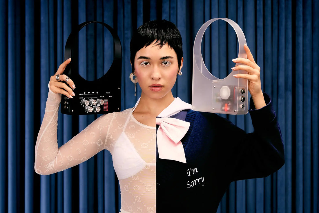 Sleek handbag with integrated DJ turntable controls.