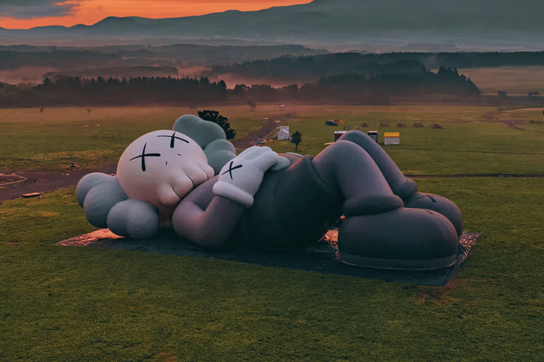 KAWS companion sculpture in botanical garden.